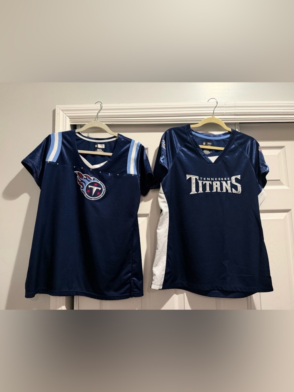 2 Navy Women's Titans  Football Jersey Tops size XL
You get both of them